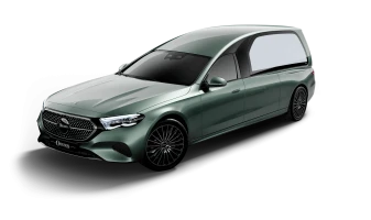 Dunkelgrüner Leichenwagen auf Mercedes-Basis, seitlich von vorn gezeigt.